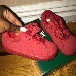 Red puma sneakers